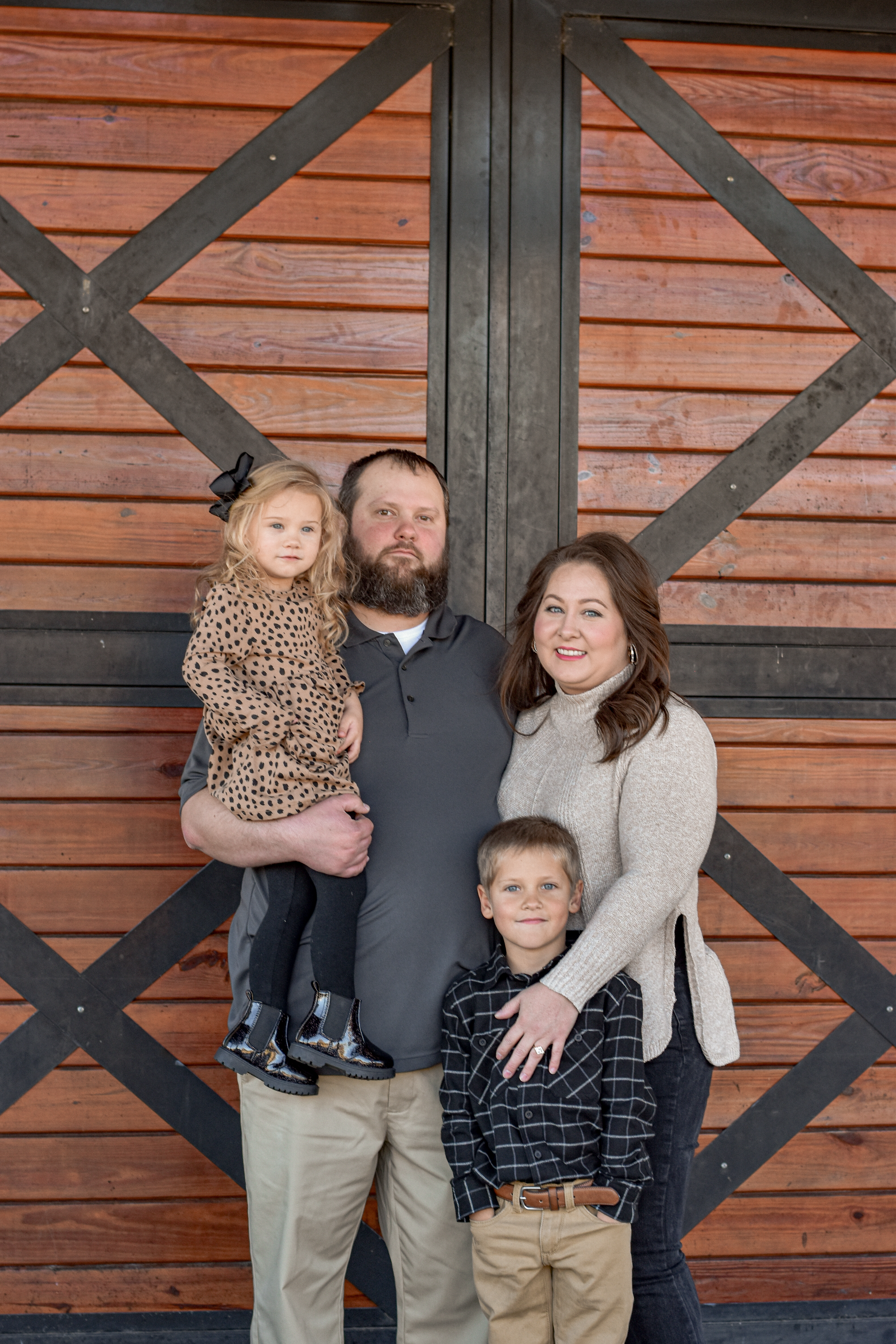 A picture of Shannon & Josh Pulfrey, the first Franchise Owners for Anchored Tiny Homes in South Carolina, and their children.