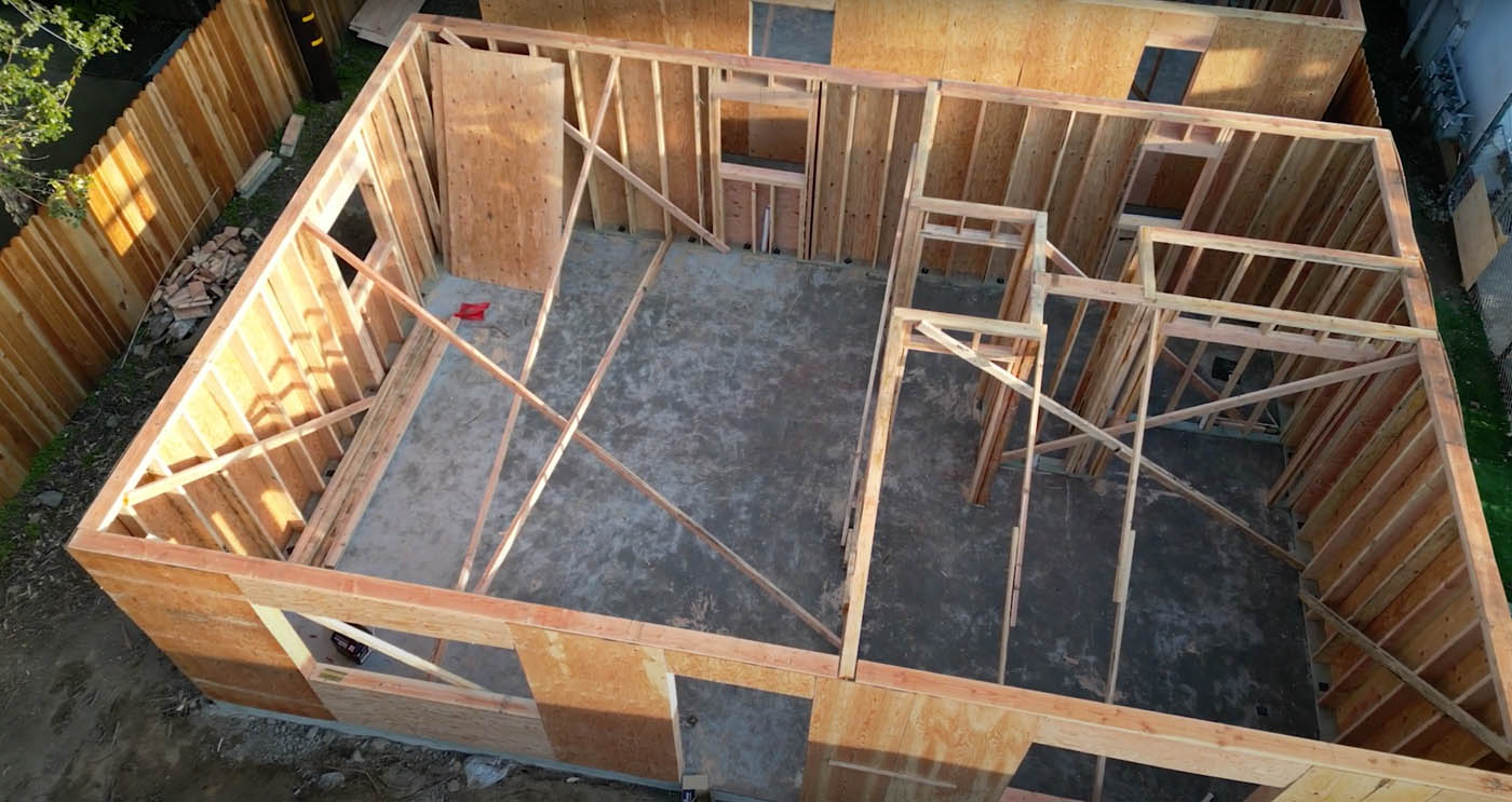 The framing for an ADU home being built on a property - service provided by Anchored Tiny Homes
